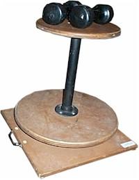 Rotating stool and two dumbbell weights