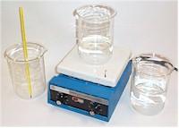 Beakers full of water, thermometer, and a hot plate