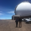 Smith and Tucker standing in front of Keck Observatory entrance, Mauna Kea