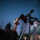 A young girl looks through a telescope during an Evening at Dark Sky Observatory event held by App State on Aug. 11, 2024. Photo by Cory Dalton