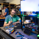 Zachary Russell, assistant professor in the Department of Physics and Astronomy at Appalachian State University (center), works with student researchers Ethan Humphries and Hunter Corman in the Ion Innovations Scientific Instrumentation Development Lab in Boone. Image courtesy of Appalachian State