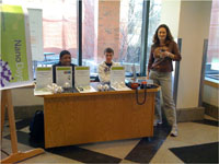 Students at outreach table