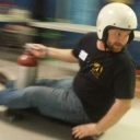 Dustin Roten on a skateboard propelled by a fire extinguisher